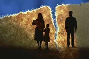 Divorce: a silhouette of a family in process of separating