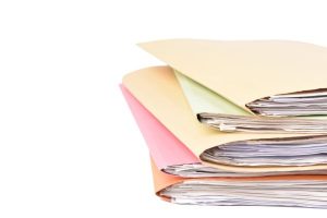 Paperwork needed for preparation of your divorce case represented by color coded file folders.